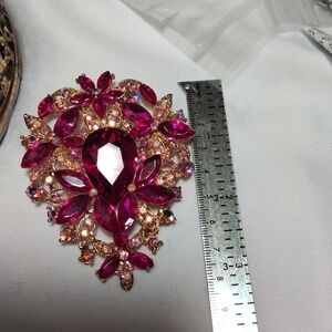 Pink rhinestone brooch